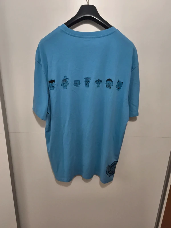 Camiseta azul claro XL lateral